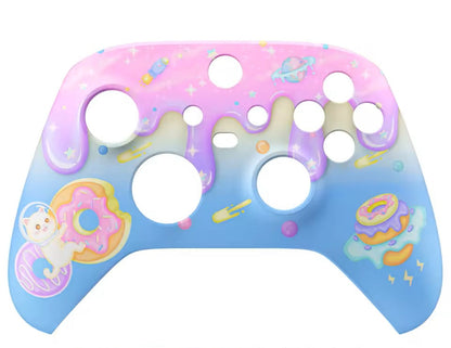 Colorful gaming controller faceplate with donut design, screws, and tools on a white background